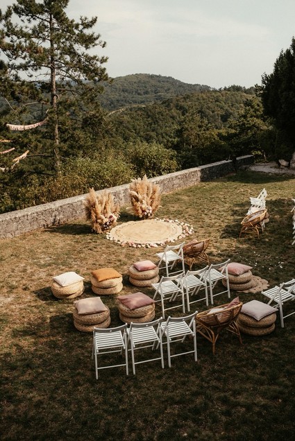 Modern bohemian wedding ceremony with pampas grass