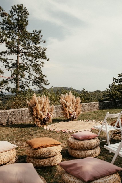 Modern bohemian wedding ceremony with pampas grass