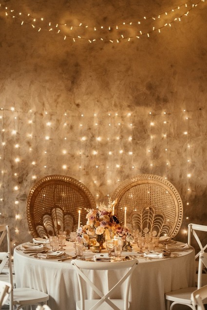 sweetheart table with lighting backdrop