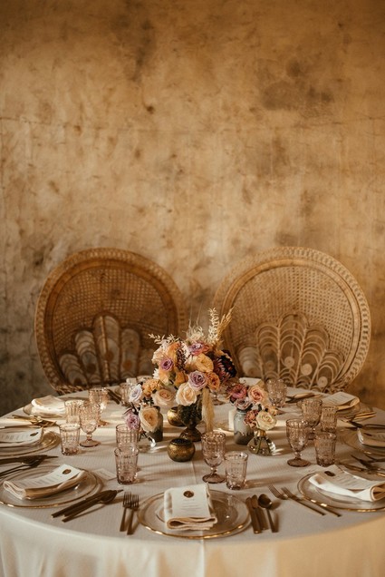 Sweetheart table with peacock chairs