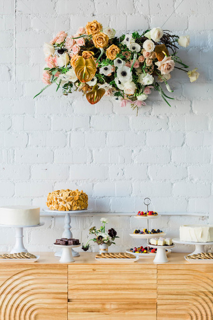 hanging flowers above bar