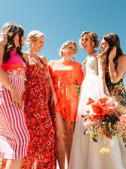 Colorful mismatched bridesmaids