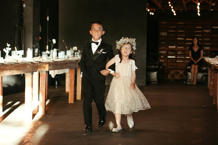 Flower girl walking down aisle