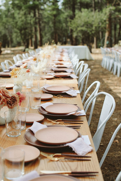 long reception table in forest wedding