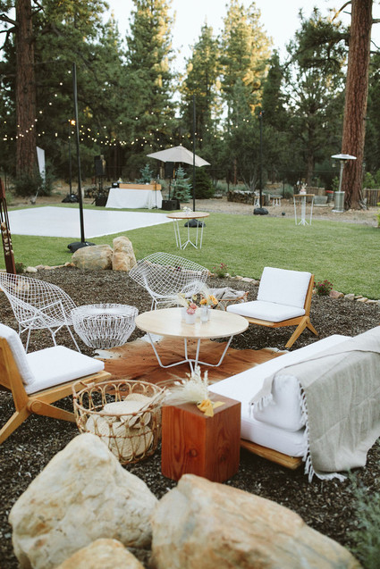 boho lounge area in woodland wedding
