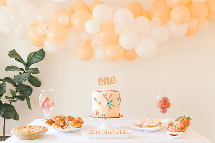 peach 1st birthday cake