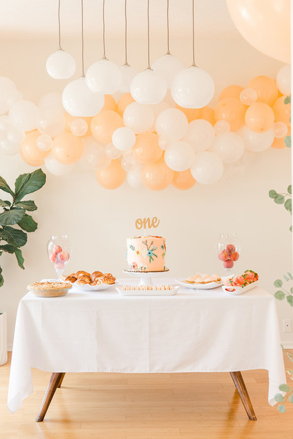 white and peach balloon backdrop