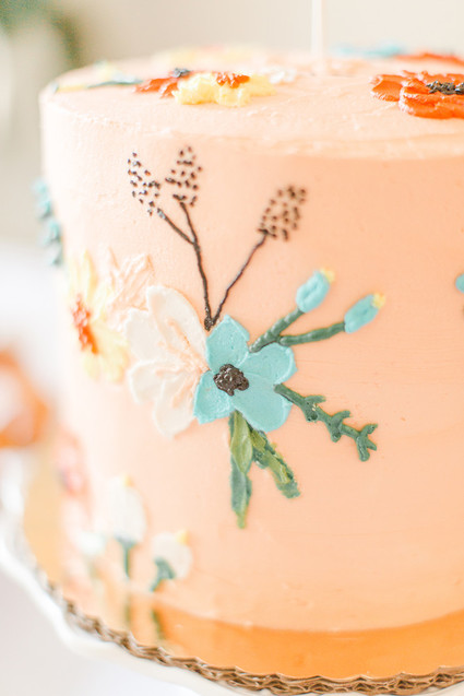 floral peach 1st birthday cake
