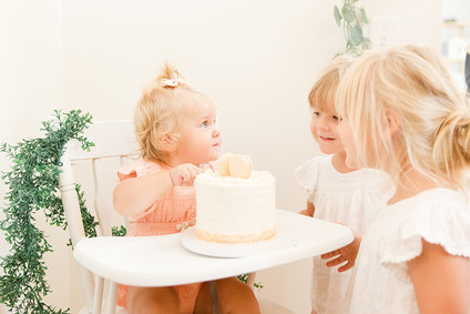 peach 1st birthday cake