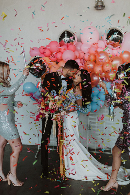 colorful wedding backdrop and confetti