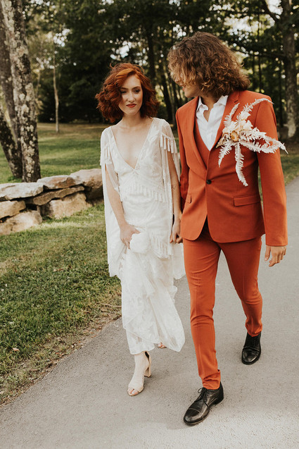 rust colored groom's suit