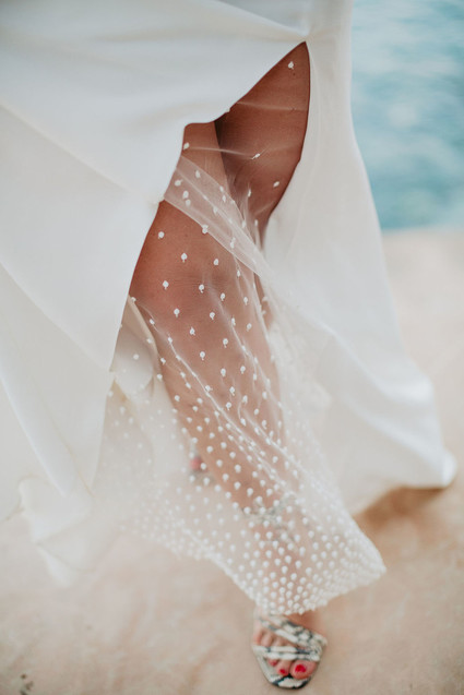 Wedding dress with sheer slit