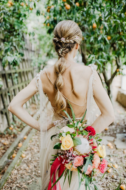 bridal ponytail and tropical bouquet