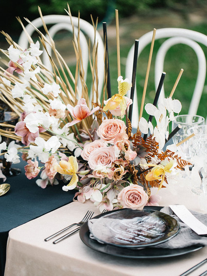 wedding centerpiece with gold accents