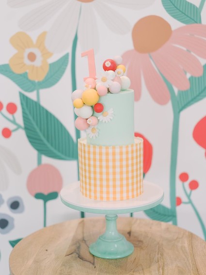Whimsical first birthday cake