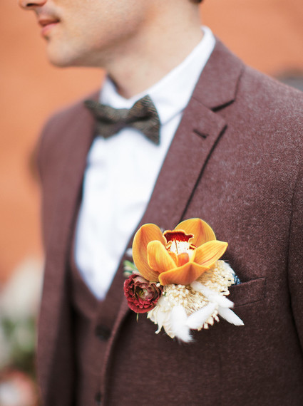 Maroon grooms suit