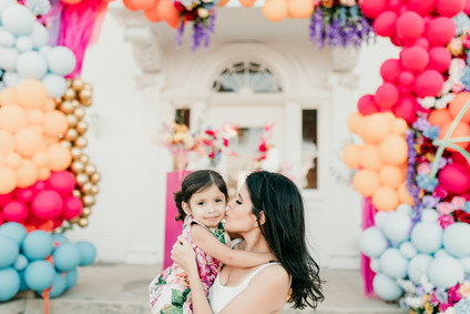 bright balloon installation for 3rd birthday party
